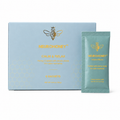 Neurohoney Calm & Relax honey packet set, featuring a light blue box with gold bee and honeycomb graphics alongside a single mint green packet on a white background.